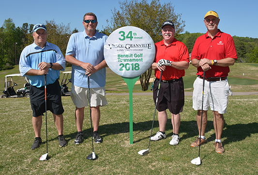 The “first gross” trophy went to the team of, from left, Ben Bryan, Tony Murray, Mike Hill and Scott Dickerson, sponsored by Jesse Sullins, with a score of 52 in the morning round of the 34th Annual Vance-Granville Community College Endowment Fund Golf Tournament at the Henderson Country Club.