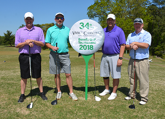 The CertainTeed team of, from left, Mark Heilman, Jeff Hoffner, Bill Oncea and Andy Archer took home the “first net” trophy with a score of 54 in the morning round of the 34th Annual Vance-Granville Community College Endowment Fund Golf Tournament at the Henderson Country Club. 