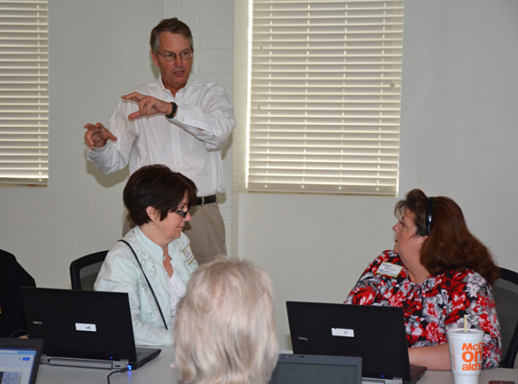 Craig Hahn (standing) leads a seminar on using Google during the Small Business Summit.