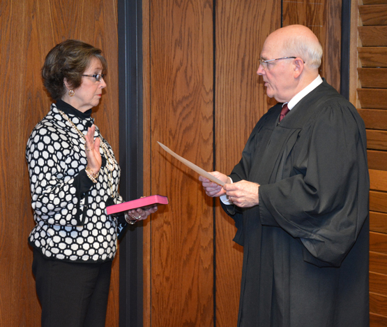 VGCC’s newest trustee, Jennifer P. “Jenny” Hester, left, of Henderson takes the oath of office from Resident Superior Court Judge Henry W. “Chip” Hight of Henderson on Nov. 21 at the trustees’ regular meeting.