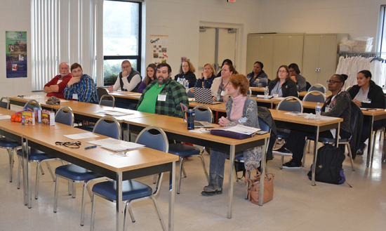 Professionals sitting in a classroom