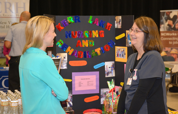 From left, VGCC Associate Degree Nursing student Jeannie Adcock of Oxford talks with Lynn Menikos of Kerr Lake Nursing & Rehabilitation Center in Henderson during the Health Sciences Career Fair.