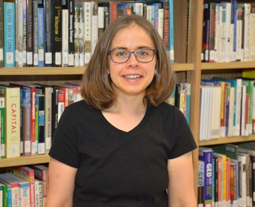 Dr. Natasha Thompson, a VGCC history instructor, is seen here in the library on the college’s Franklin County Campus near Louisburg. “Teaching on four campuses means I'm always on the move,” Thompson said. She noted that NC LIVE streaming videos “are accessible, fast, and always available.” (VGCC photo)