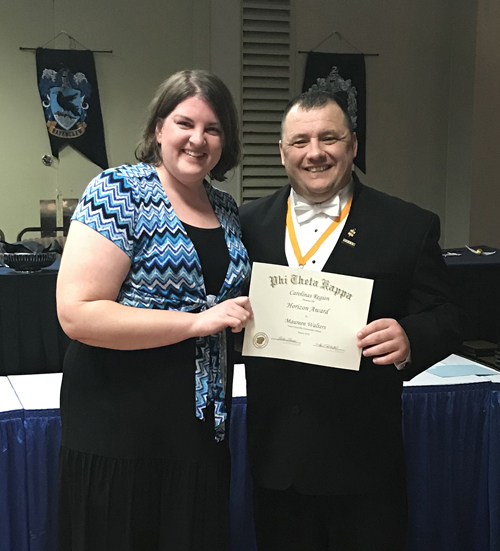 VGCC Phi Theta Kappa chapter advisor Maureen Walters (left) accepts the “Horizon Award” from Ricky Swing, outgoing president for the Carolinas Region, during the convention in Myrtle Beach, S.C. 