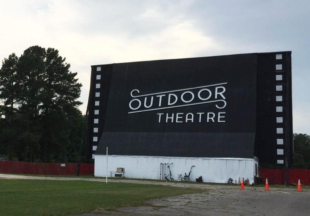 Large sign outside of Raleigh Road Outdoor Theatre that reads "Outdoor Theatre